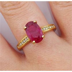 18ct gold oval ruby ring, with diamond set shoulders, hallmarked, ruby approx 2.35 carat