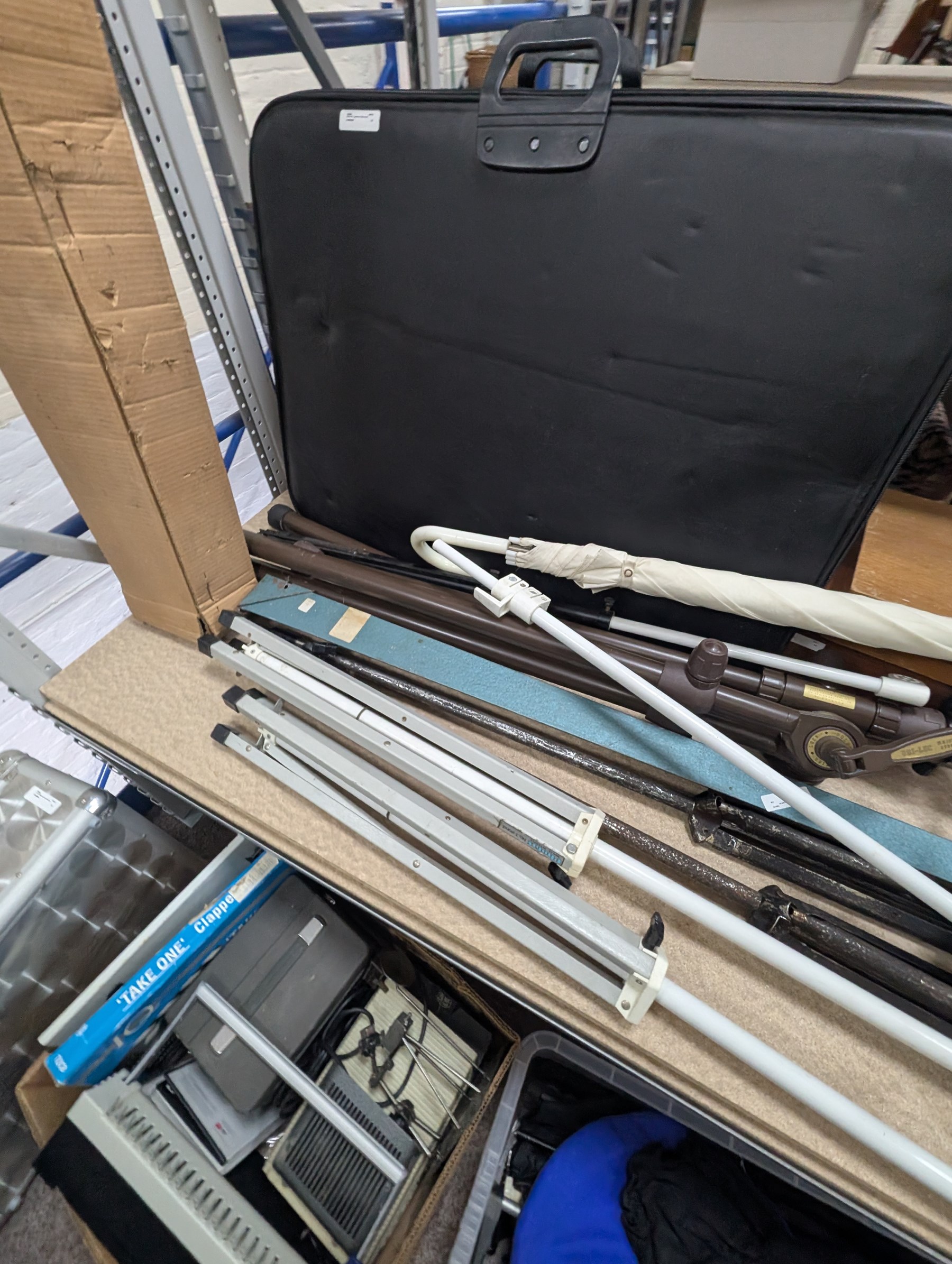 Collection of photography equipment, including cases, tripods, screens, guillotine, lighting etc