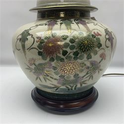 Table lamp of squat baluster form, decorated with Mandarin ducks and floral  landscape, upon a circular wooden base H42cm