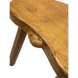 'Mouseman' oak three-legged stool, kidney shaped dished seat with carved mouse signature to edge, by Robert Thompson of Kilburn