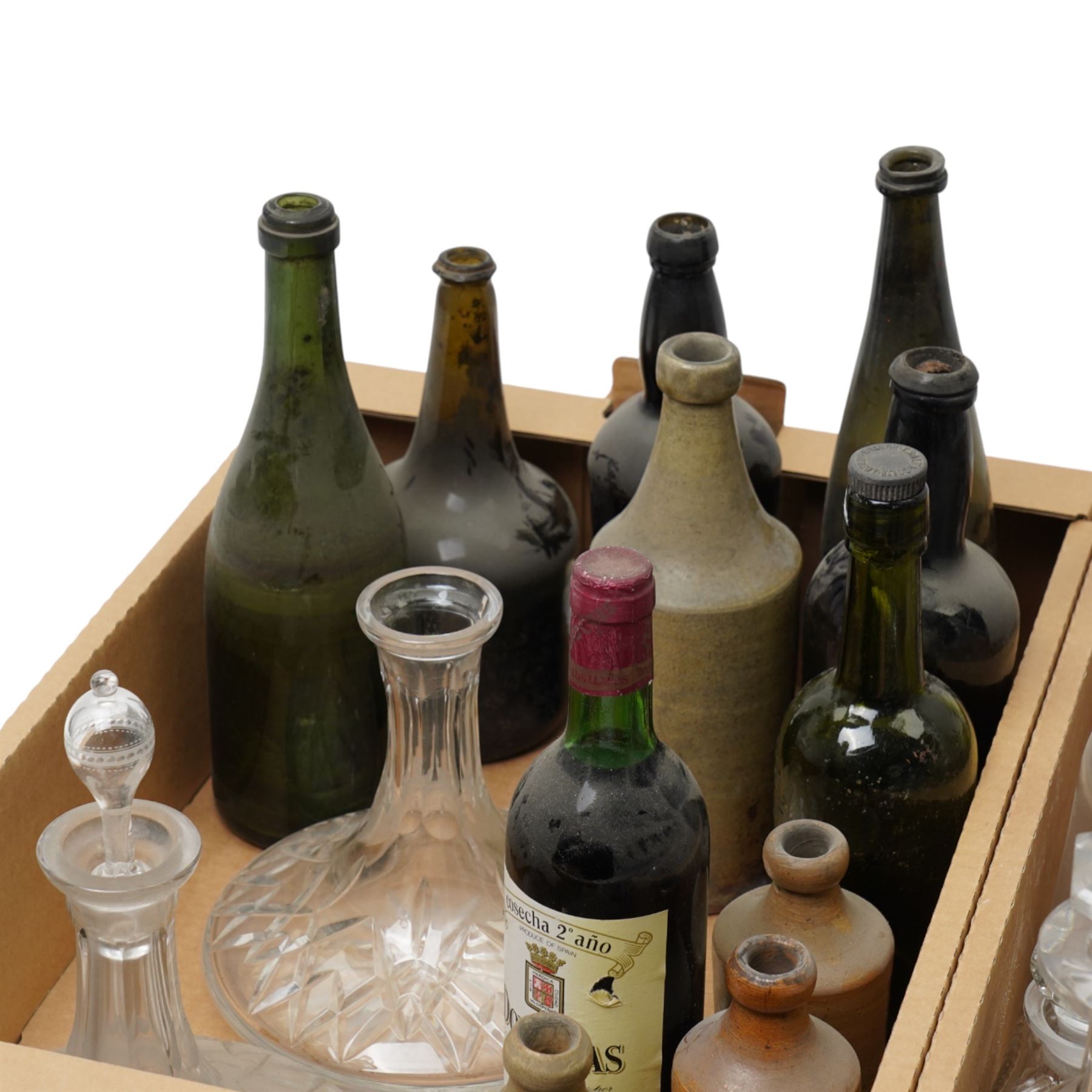 Glass dome shade, various glass decanters and coloured glass bottles