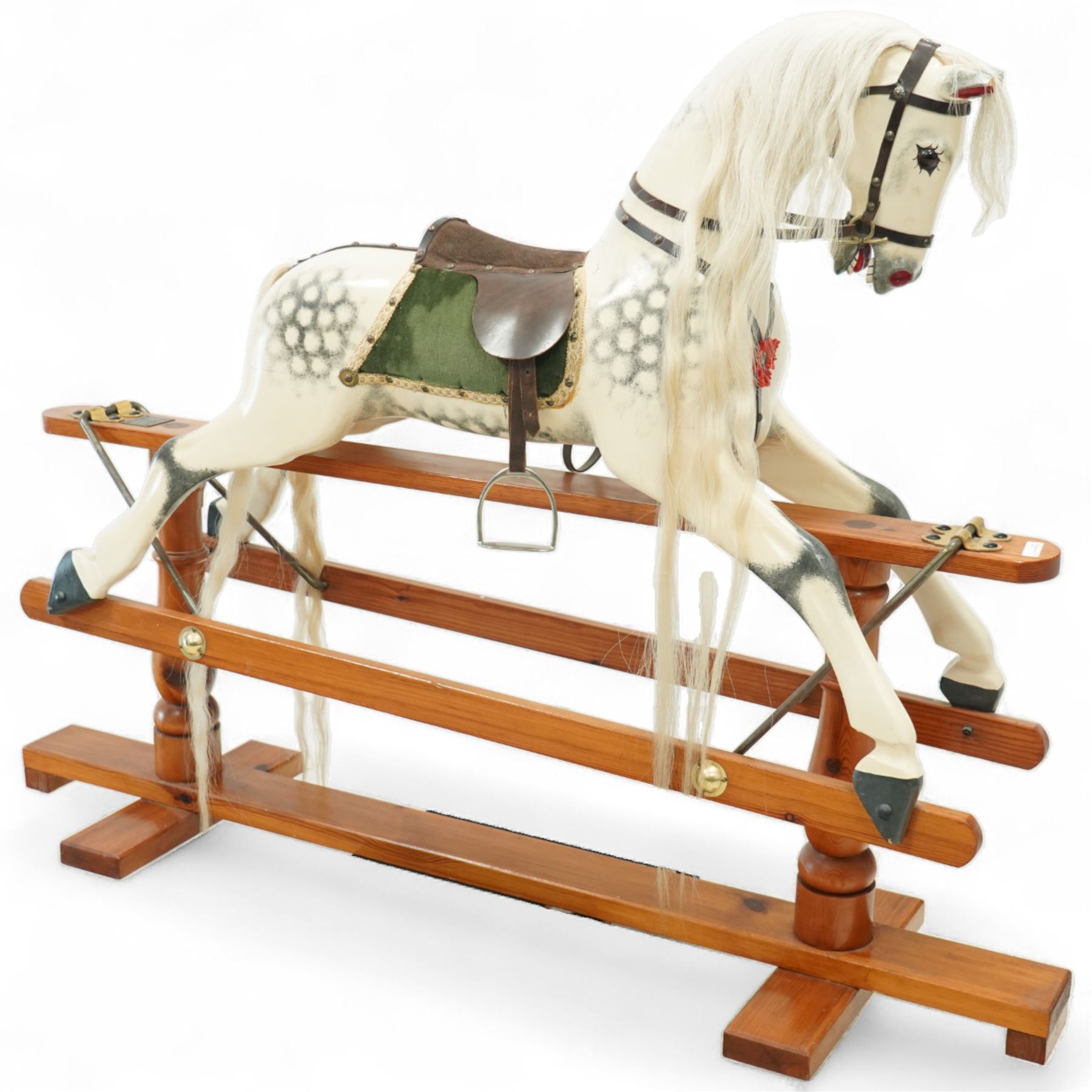 Antony Shackleton of Snainton - 1997 rocking horse titled ‘Fred’, the painted dapple grey body with real horsehair mane and tail, green velvet saddle cloth and leather tack, mounted on a pine swing stand with brass fittings