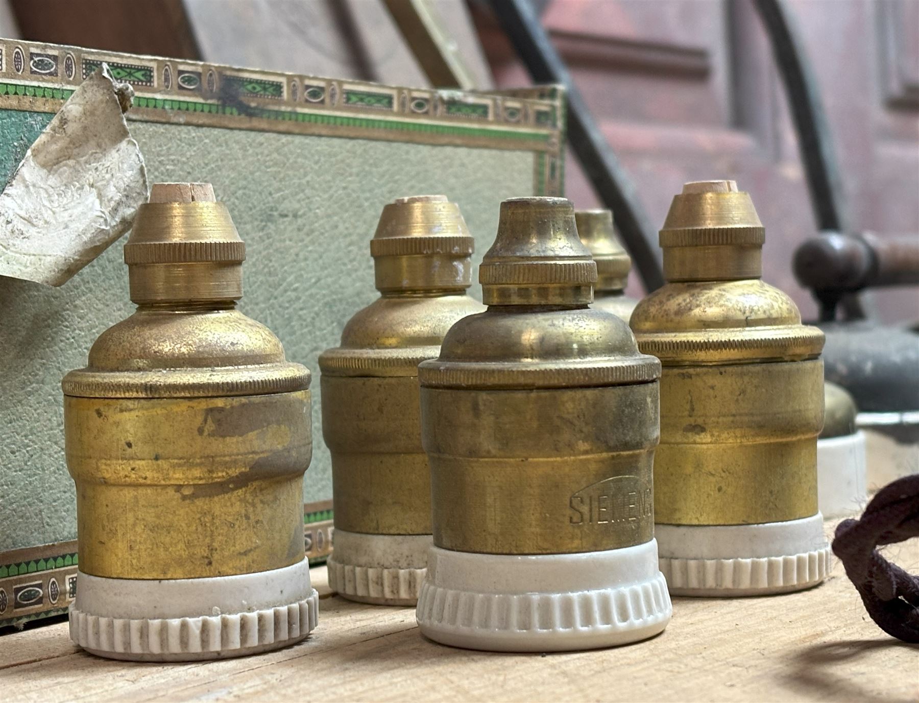 Group of antique and vintage electrical hardware, including a set of five brass and ceramic bulb holders, three early 20th century wall sconces, light switches etc.  - COLLECTION BY APPOINTMENT FROM: The White House, Thirsk Road, Easingwold, York, YO61 3NF - CALL 01723 507111 TO ARRANGE