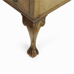 Waring & Gillow - Early 20th century mahogany desk, the leather-inset top above a shaped kneehole, central compartmented frieze drawer flanked by twin banks of of three drawers, each with brass handles, raised on cabriole legs with carved ball and claw feet (Height from floor to underside 62cm)