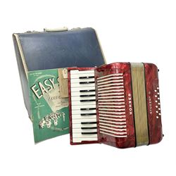 German Hohner student II compact accordion with 26 keys and 12 bass registers in a hard case With tutor