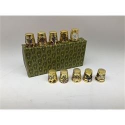 Ten cloisonné thimbles, decorated with animals, flowers, birds and butterflies  
