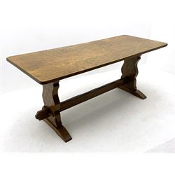 ‘Gnomeman’ oak dining table, rectangular adzed top, shaped end supports on sledge feet joined by pegged stretcher, carved with gnome signature, by Thomas Whittaker of Littlebeck