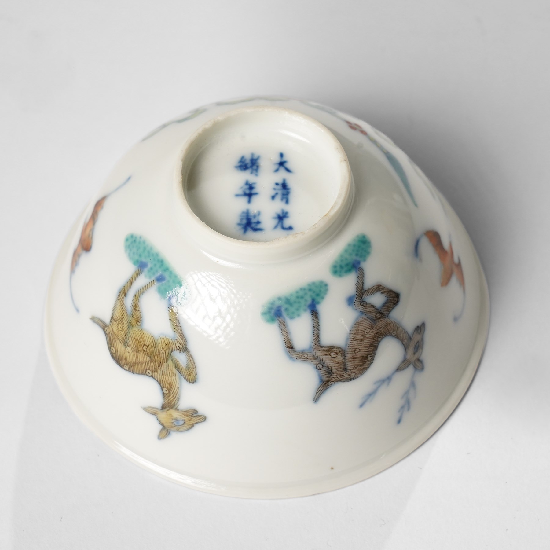 Chinese tea bowl painted with bats and deer, six character Guangxu mark to base, D9.5cm H5cm