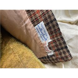 Two early 20th century straw filled jointed teddy bears, first example wearing a tweed jacket bearing Geoffrey Saville label, with leather padded paws and ears, horizontally stitched nose and humpback; second example with applied eyes, vertically stitched nose and faux leather paw pads, both with growler mechanisms, tallest H74cm 