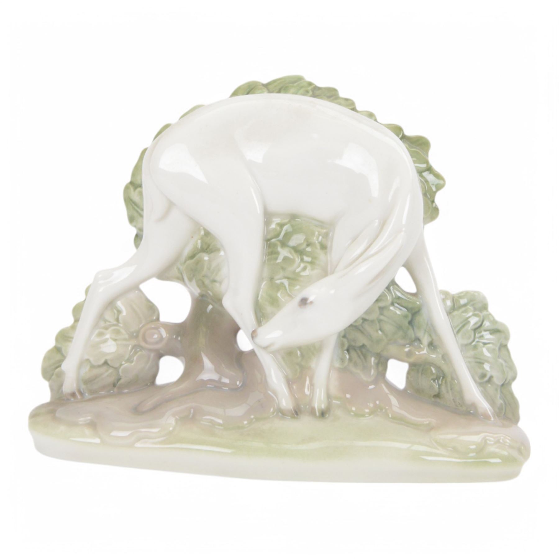 Royal Copenhagen Deer on Green Base, by H.H Hansen no 2051, with printed mark beneath, H12cm