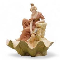 Royal Dux figure of a maiden collecting water above a shell bow, H25cm and another figural dish modelled as a maiden rising out of a shell, H24cm (2)