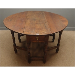  18th century & later oak drop leaf table, with fall leaves and end drawer on double gate action turned supports with stretchers, W142cm, H78cm, D133cm   