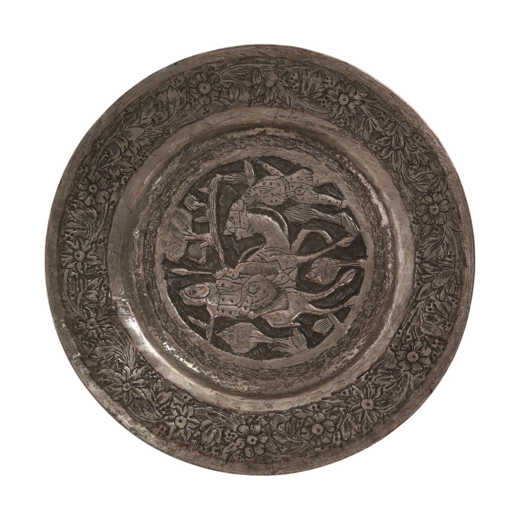 Set of four Persian silvered copper plates, decorated in relief, the central panel depicting figures in various scenes with a floral boarder, D17cm