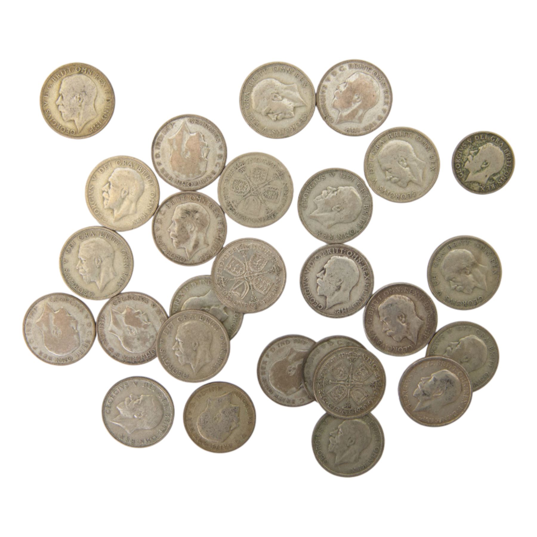 Three King George V pre-1920 silver florin coins, twenty three pre-1947 silver florins, one silver shilling, and a ten shilling note