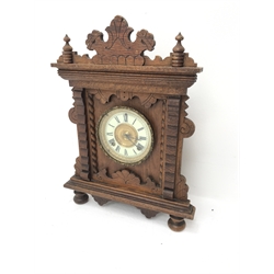 Late 19th century American 'Gingerbread' clock, twin train Ansonia movement striking on coil, H47cm
