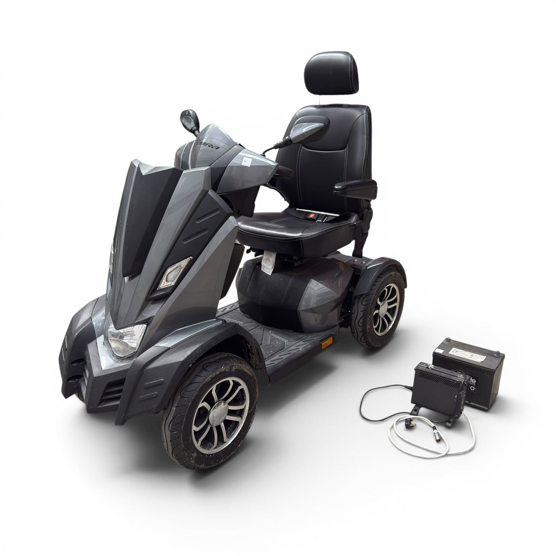 Drive King Cobra  - mobility scooter, four wheel model with black seat and headrest, lights and grey bodywork, 800 miles.