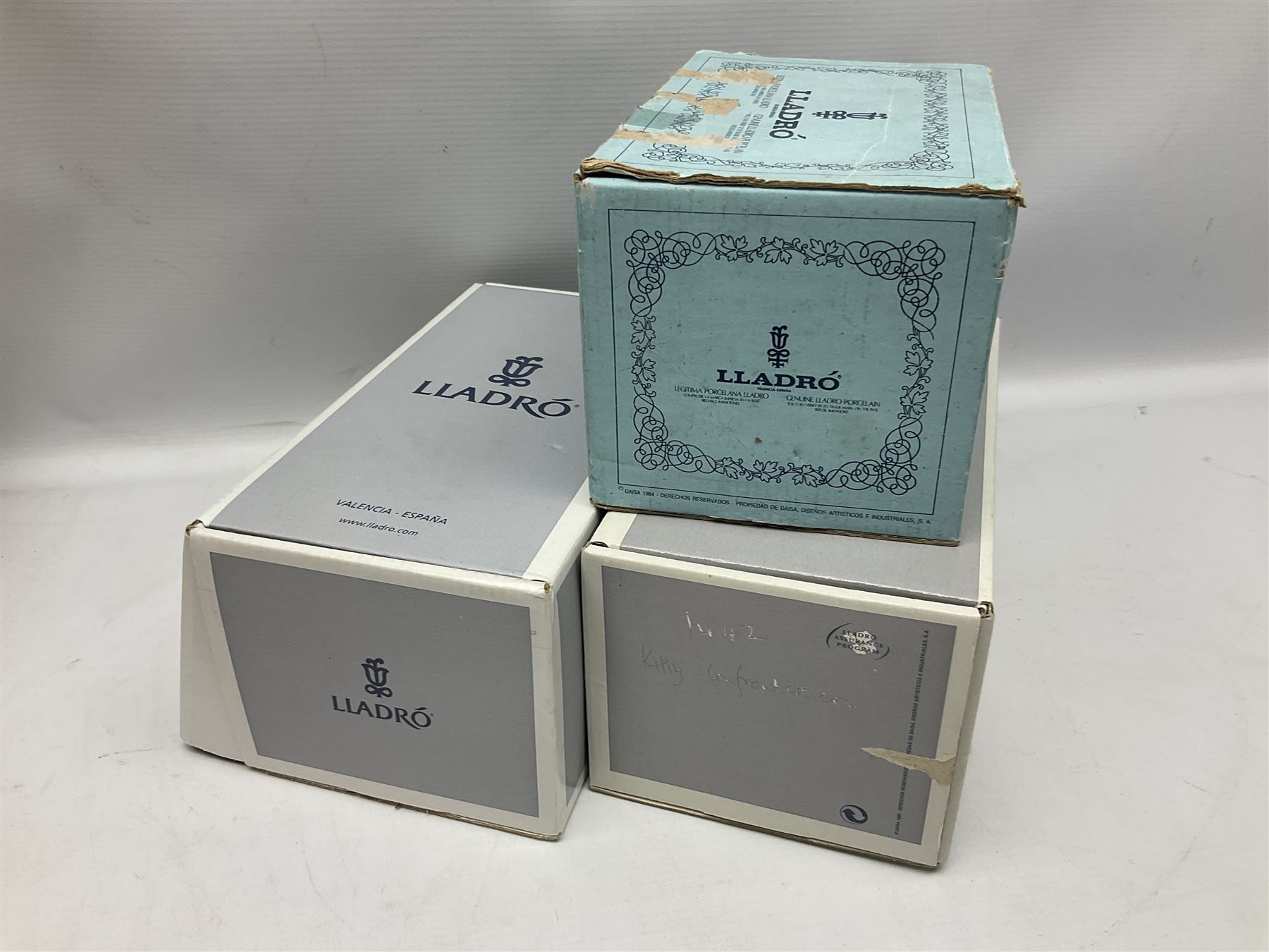 Six Lladro figures, comprising Naughty Dog no 4982, Best Friend 7620 and My Buddy no 7609, Kitty Confrontation no 1442, It Wasn't Me no 7672 and Rabbit Eating no 4772, three with original boxes, largest example H22cm