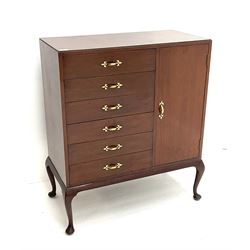 Mid 20th century mahogany music cabinet, fitted with six manuscript drawers with fall fronts, right-hand cupboard enclosing record storage compartments, on cabriole supports