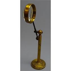  Late 19th/early 20th century gilt brass magnifying glass with convex lens on telescopic adjustable stand, H25cm max  
