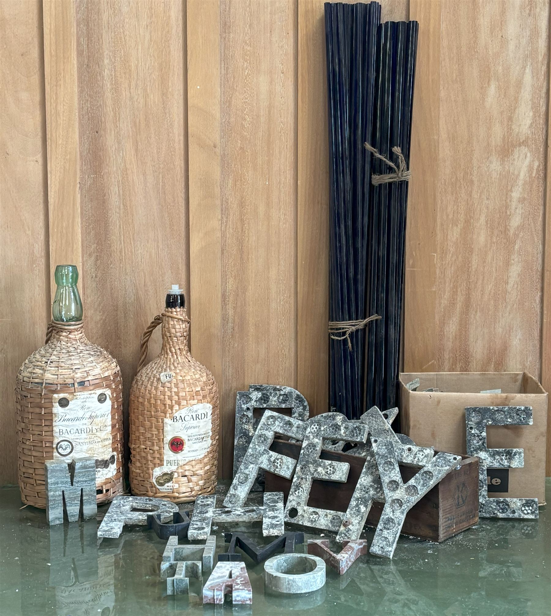 Mixed lot to include; sign board letters, marble letters, two glass Bacardi bottles and a quantity of blue glass blowing rods.  - COLLECTION BY APPOINTMENT FROM: The White House, Thirsk Road, Easingwold, York, YO61 3NF - CALL 01723 507111 TO ARRANGE