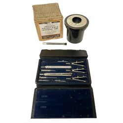 Charvos cased set of drawing instruments together with Johnson adjustable developing tank