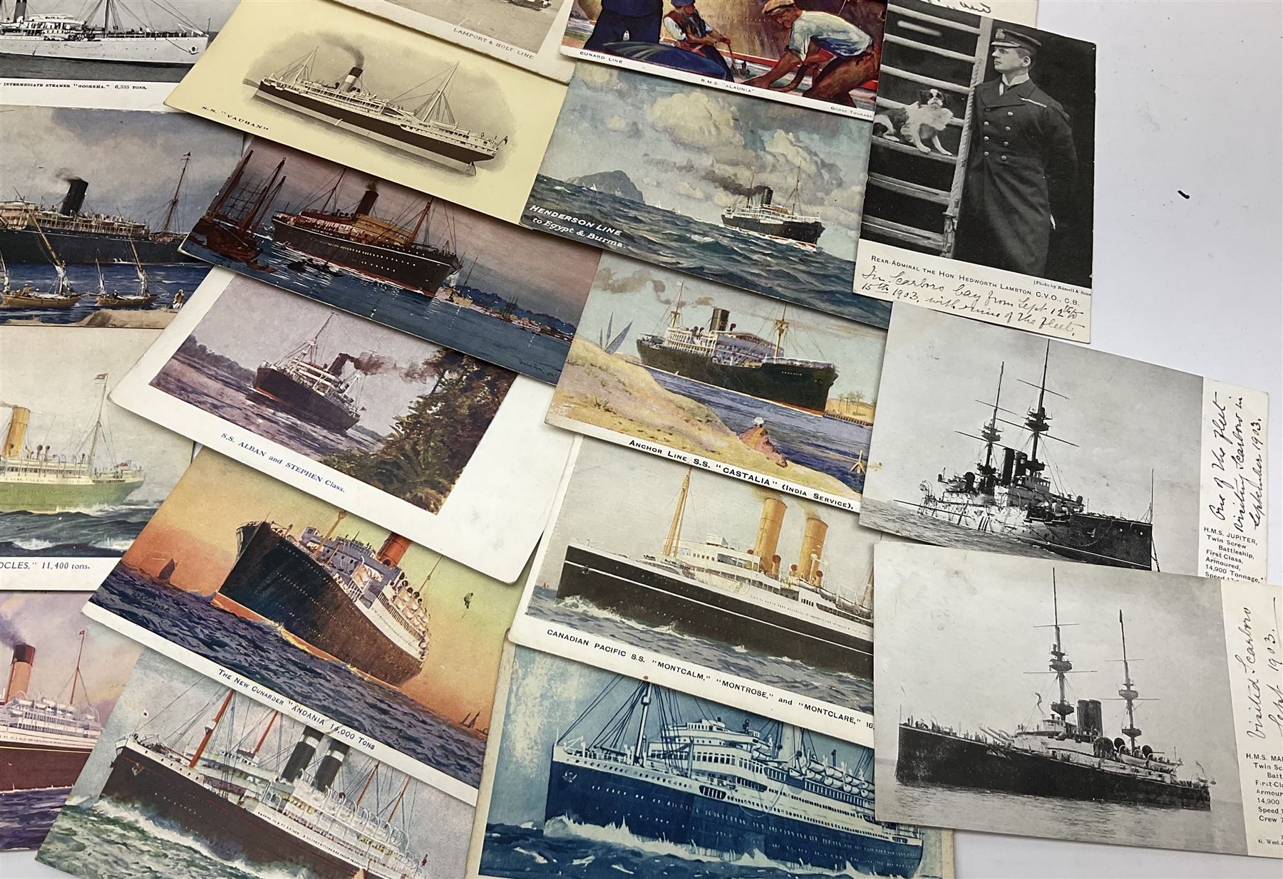 Sixty-five early 20th century postcards of passenger liners including White Star, Red Star, Atlantic Transport, Anchor, Cunard, Henderson, Booth, Union Castle, Holland America, Lamport & Holt, P. & O., New Zealand, Canadian Pacific, British India etc; and ten Edwardian postcards of Naval warships and officers (75)