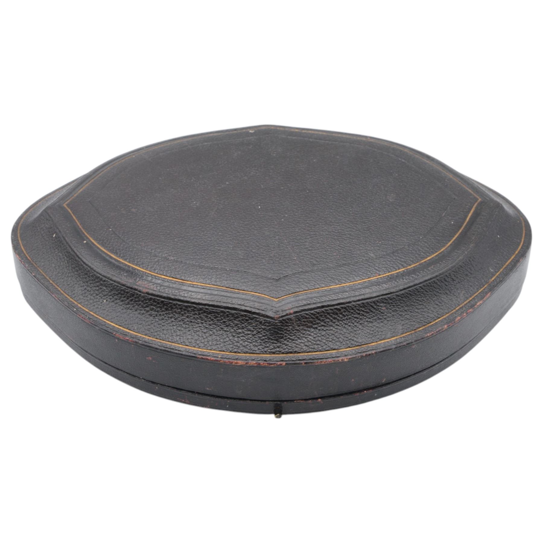 Victorian silver berry dish, of oval form, profusely embossed with floral and foliate decoration, hallmarked Goldsmiths & Silversmiths Co (William Gibson & John Lawrence Langman), London 1894, and a Victorian silver berry spoon, the gilt bowl embossed with berries, hallmarked London 1846, maker's mark worn and indistinct, contained within a tooled leather retailers case for Goldsmiths & Silversmiths London, both also with French weevil import marks, bowl end to end W27cm