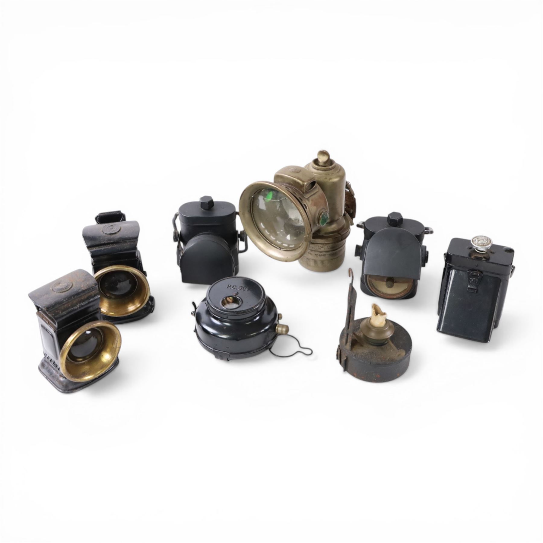 Bicycle lamps and similar, including three WWII black out lanterns, two by Joseph Lucas Ltd, the other by H.M & Co Ltd, all with broad arrows, three further Lucas bicycle lamps including two oil lamps and a carbide lamp