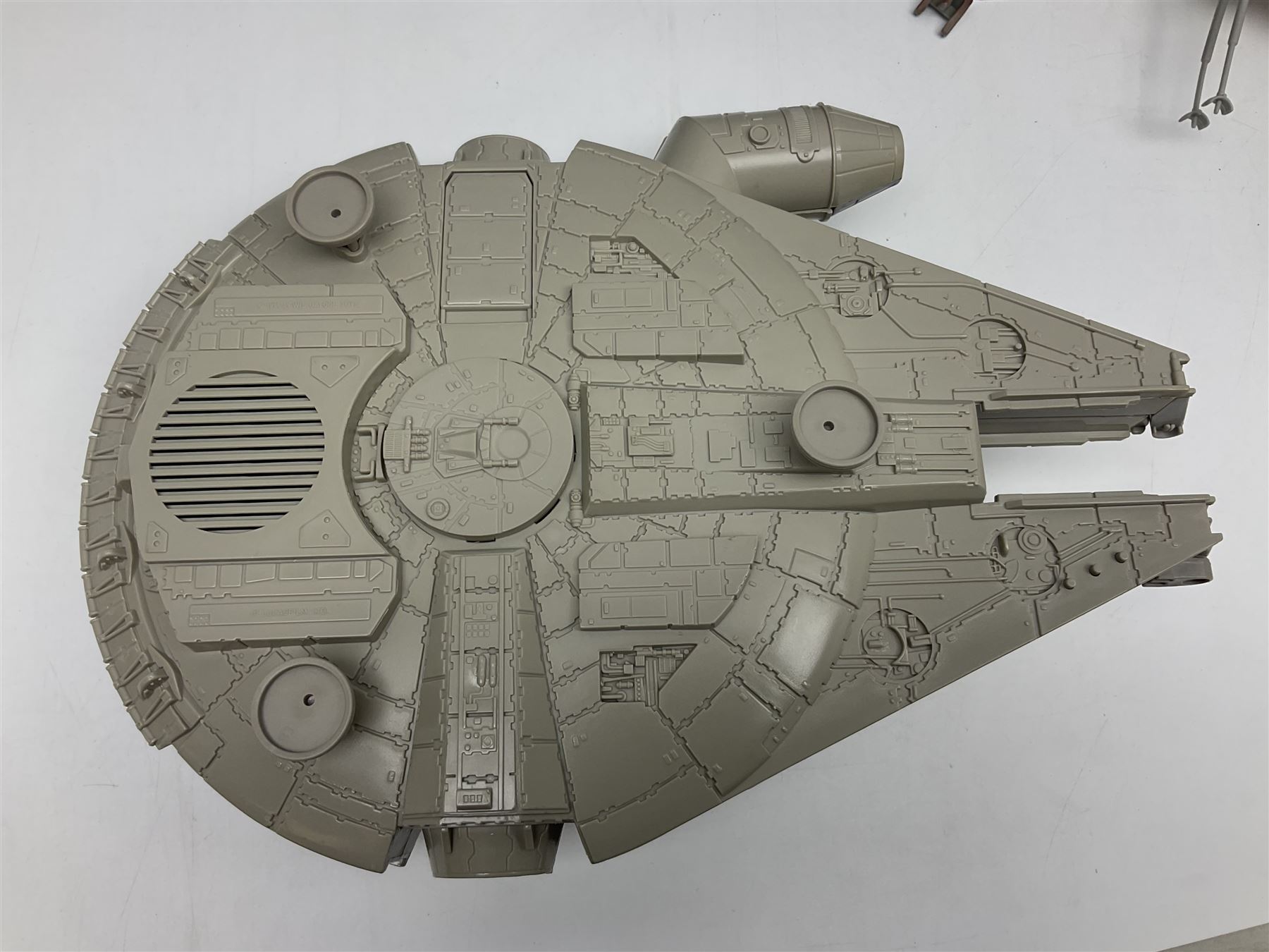 Star Wars - four space/land vehicles comprising Millenium Falcon with hinged top and figures; TIE Fighter; X-Wing Fighter with pilot; and AT-ST 'Chicken Walker' transporter; all unboxed (4)