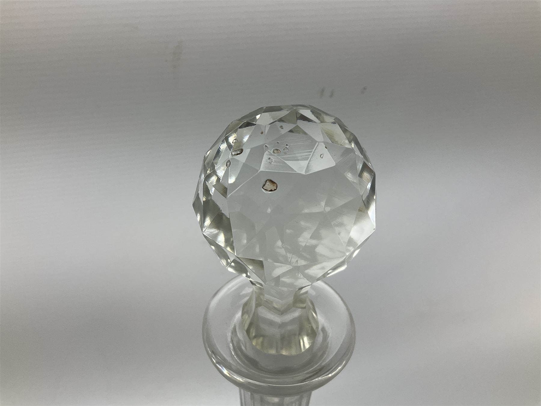 Pair of cut glass decanters and stoppers, together with a cut glass ships decanter and stopper, and pair of claret jugs with star cut decoration to bodies, in one box, (5)