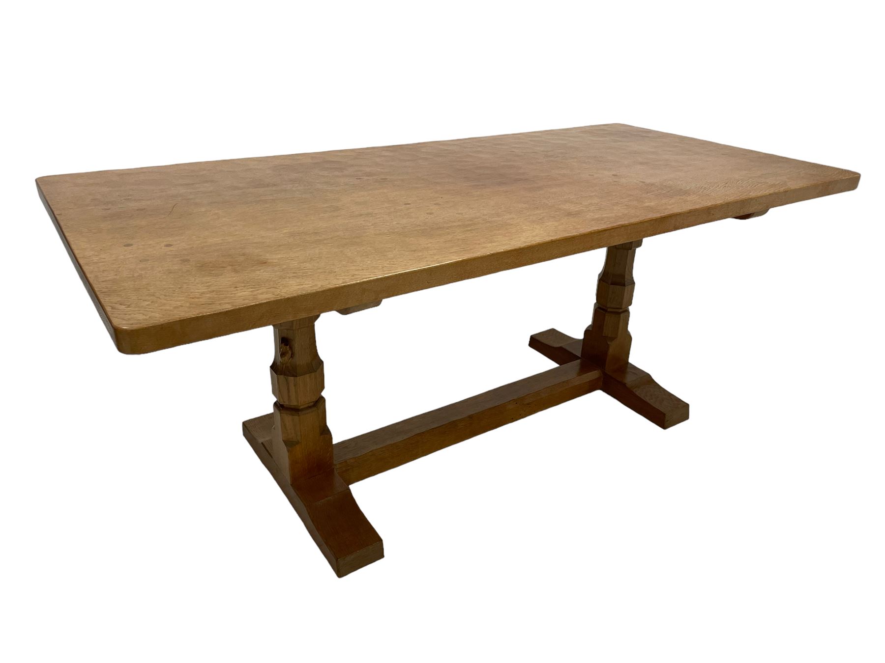 Mouseman - oak 6' refectory dining table, rectangular adzed and pegged top, two octagonal pillar supports on sledge feet joined by floor stretcher,  carved with mouse signature, by the workshop of Robert Thompson, Kilburn