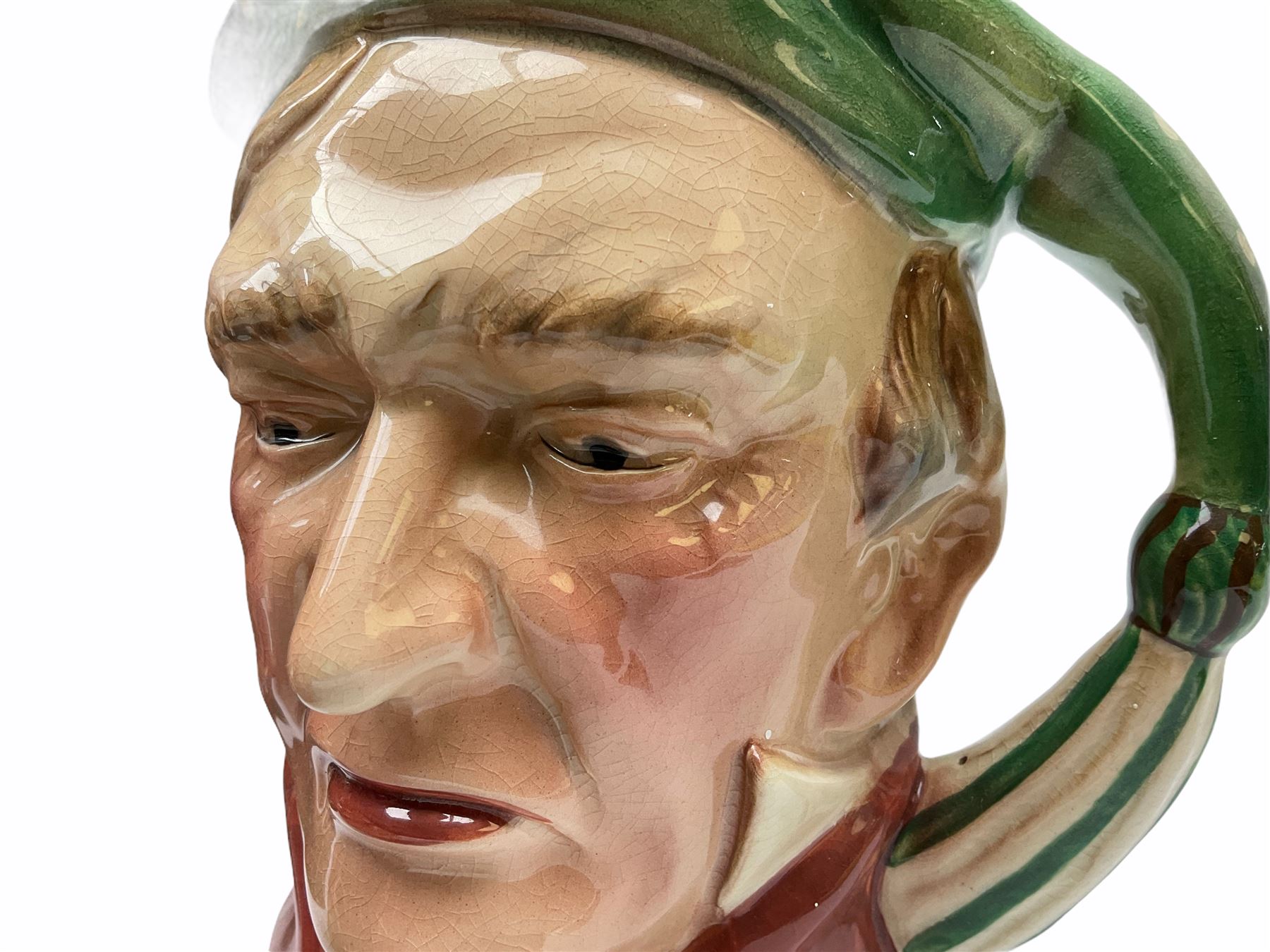 Character and toby jugs, including a staffordshire pottery style toby jug, Olfaire toby jug, Beswick character jug depicting Scrooge, Royal Doulton Veteral Motorist etc, together with Royal Doulton Sweet Dreams figure. 