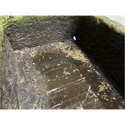 Large 19th century D shaped stone trough