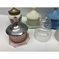 Collection of glass beehive honey pots, to include a blue slag example, milk glass, pink, green, etc together with four white metal examples (16) 