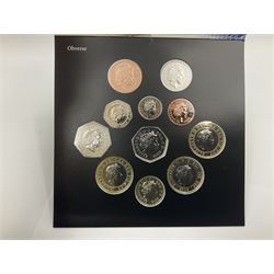The Royal Mint United Kingdom 2009 brilliant uncirculated coin collection, including Kew Gardens fifty pence, in card folder