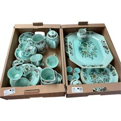Adams part dinner service, decorated with flowers on a green ground, including six dinner plates, milk jug, tea pot, serving plates etc, in two boxes   