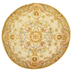 20th century French Aubusson style circular carpet, cream ground of Savonnerie design with scrolling floral and scallop motifs