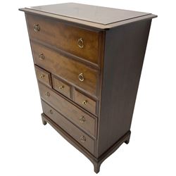 Stag Minstrel - mahogany chest, fitted with three short between four long drawers, on bracket feet