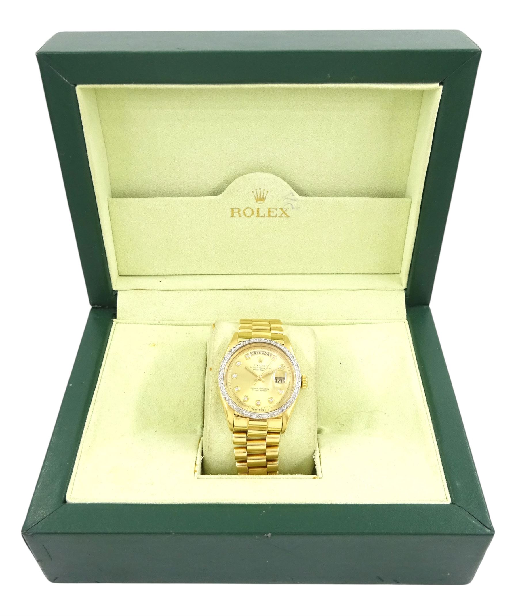 Rolex Oyster Perpetual Day-Date gentleman's 18ct gold automatic wristwatch, circa 1970, Ref. 1803, serial No. 2492514, champagne dial with after market diamond dot hour markers and diamond set bezel, on 18ct gold President bracelet, with fold-over clasp, boxed