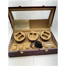 Electronic watch winder for three watches, in laminated mahogany finish, H24cm, W54cm