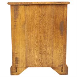 Small 20th century burr oak chest, the figured top over three graduated drawers with moulded fronts and pierced brass handles, on shaped feet