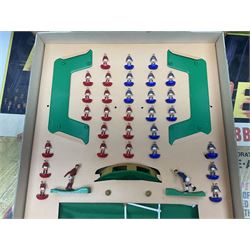 Subbuteo - three boxed sets comprising Football Express with two five-a-side teams and floodlighting; Continental with four teams and accessories; and International Edition Table Rugby with two teams; together with a Real Madrid 1974-75 League Champions pennant (4)