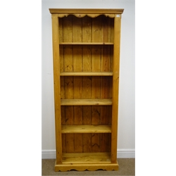  Solid pine open bookcase, projecting cornice, four shelves, shaped plinth base, W76cm, H183cm, D28cm  