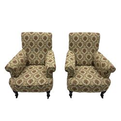 Early 20th century two seat drop arm sofa (W152cm), and pair of
matching armchairs (W83cm), upholstered in beige patterned fabric