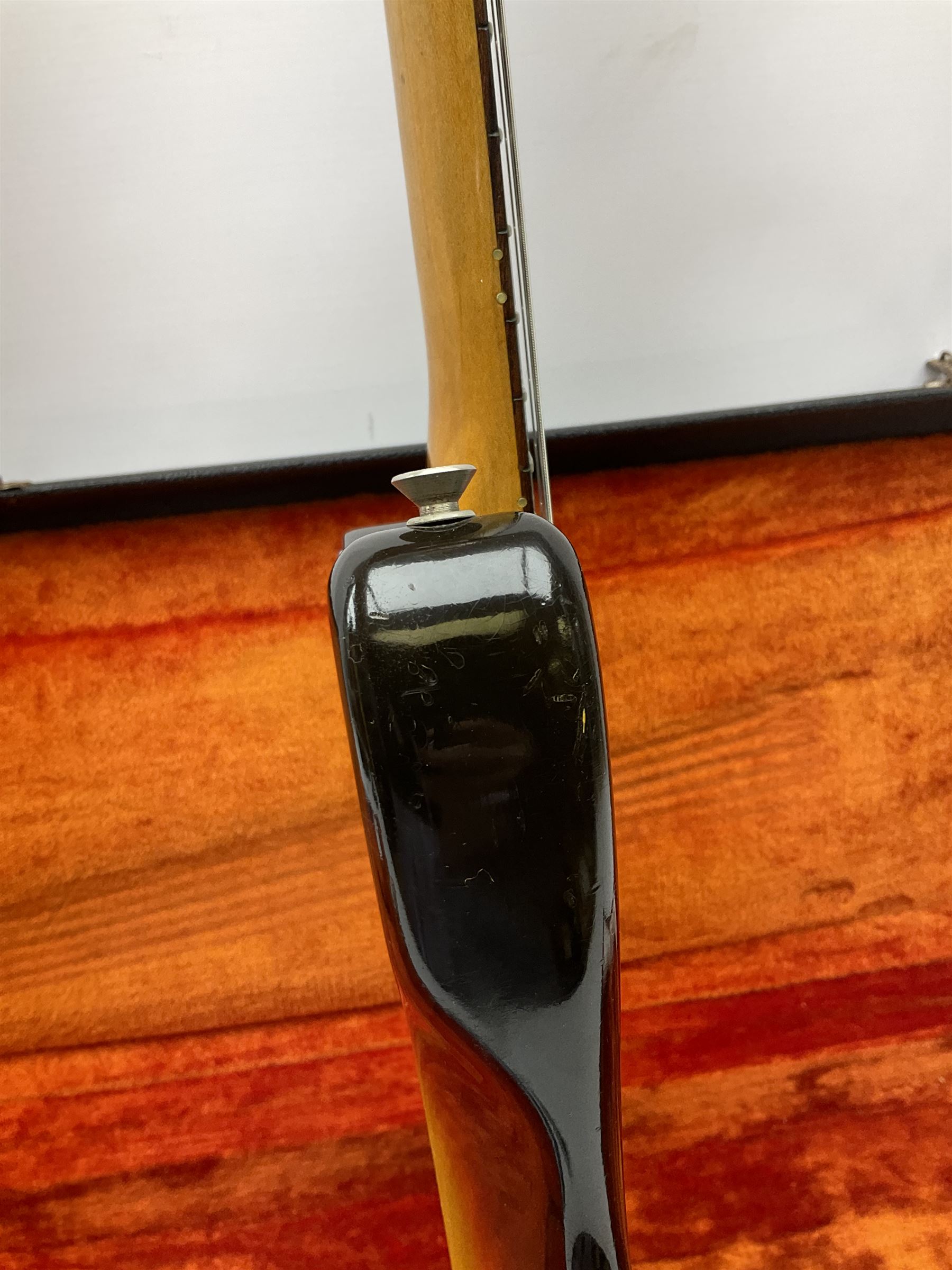 Fender three-tone Sunburst 12-string electric guitar c1965/6 Fullerton USA, with alder body and maple neck, the Indian rosewood fretboard with twenty-one frets and pearloid dot markers, fender electric XII bridge, F-stamp tuners (non-original), two split single coil pick-ups, master volume and tone and four-way switch, serial no.129730, L108cm; in original Fender case bearing label for Rivington Guitars New York with copy of original invoice; together with GuitarKes set-up and service certificate dated October 2021
