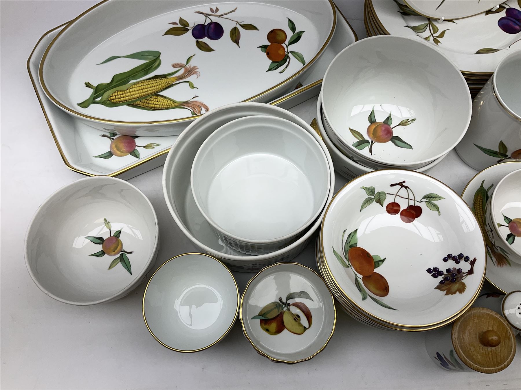 Royal Worcester Evesham pattern dinner wares, to include lidded tureens, eight dinner plates, serving tray, ramekins, jug, seven bowls, egg cups, serving dishes etc, approx 47 pcs, all with printed marks beneath