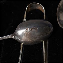 Set of six silver seal top coffee spoons and tongs Sheffield 1924 Maker Cooper Bros & Sons Ltd, cased and a set of six silver bead knop coffee spoons, cased