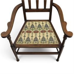 Robson & Sons, Newcastle on Tyne - Arts & Crafts high back armchair, upholstered in Mackintosh style fabric, shaped armrests and cylindrical supports united by stretchers