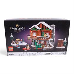 Two Lego Winter Village Collection sets, comprising Elf Club House no. 10275 and Alpine Lodge no. 10325, both boxed