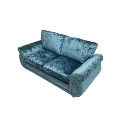 DFS - two seat sofa of scrolling design, upholstered in blue crushed velvet, with matching armchair